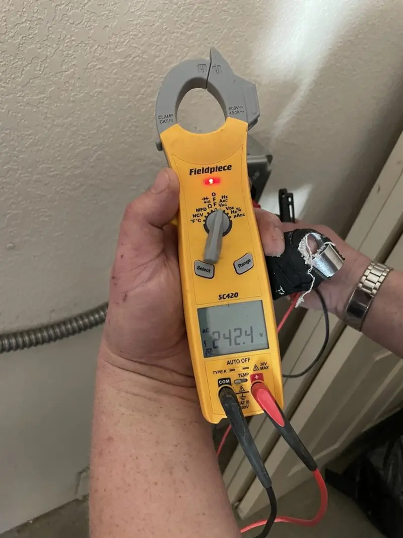 Voltage testing with clamp meter during Aluminum Wiring Replacement in West Earl